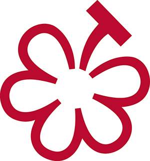Het logo van de Michelin Grape, de nieuwe waardering voor wijnproducenten.